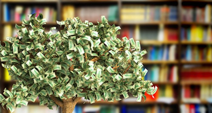Tree with leaves of money with bookcase in background